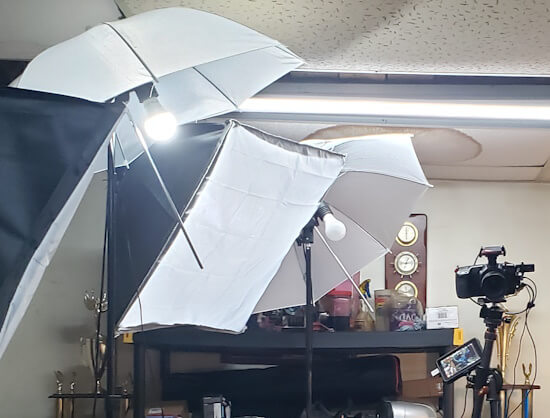 Camera extension arm on tripod