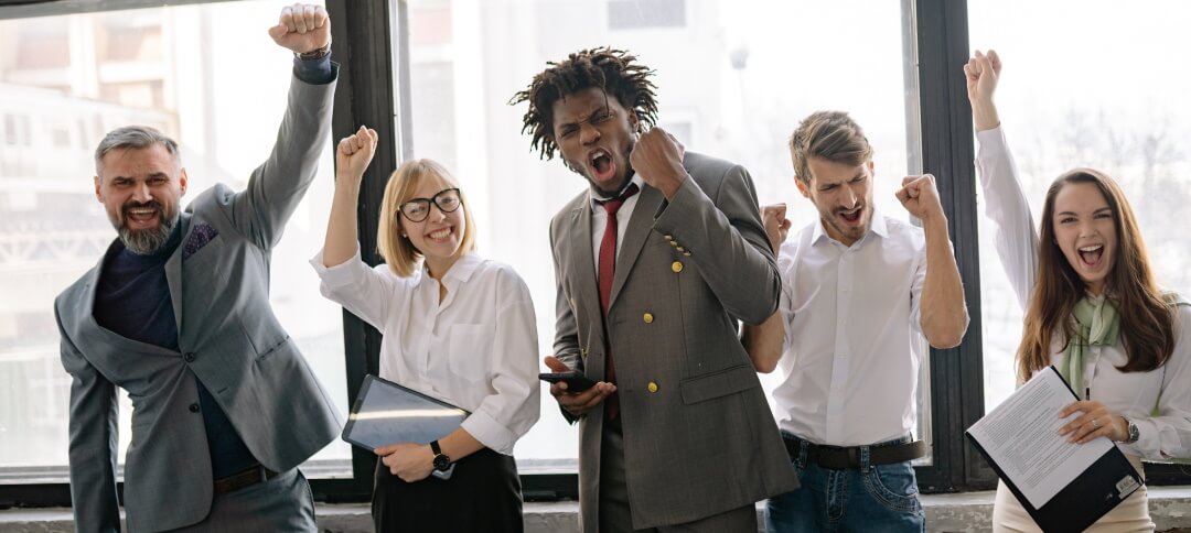 Office workers cheering